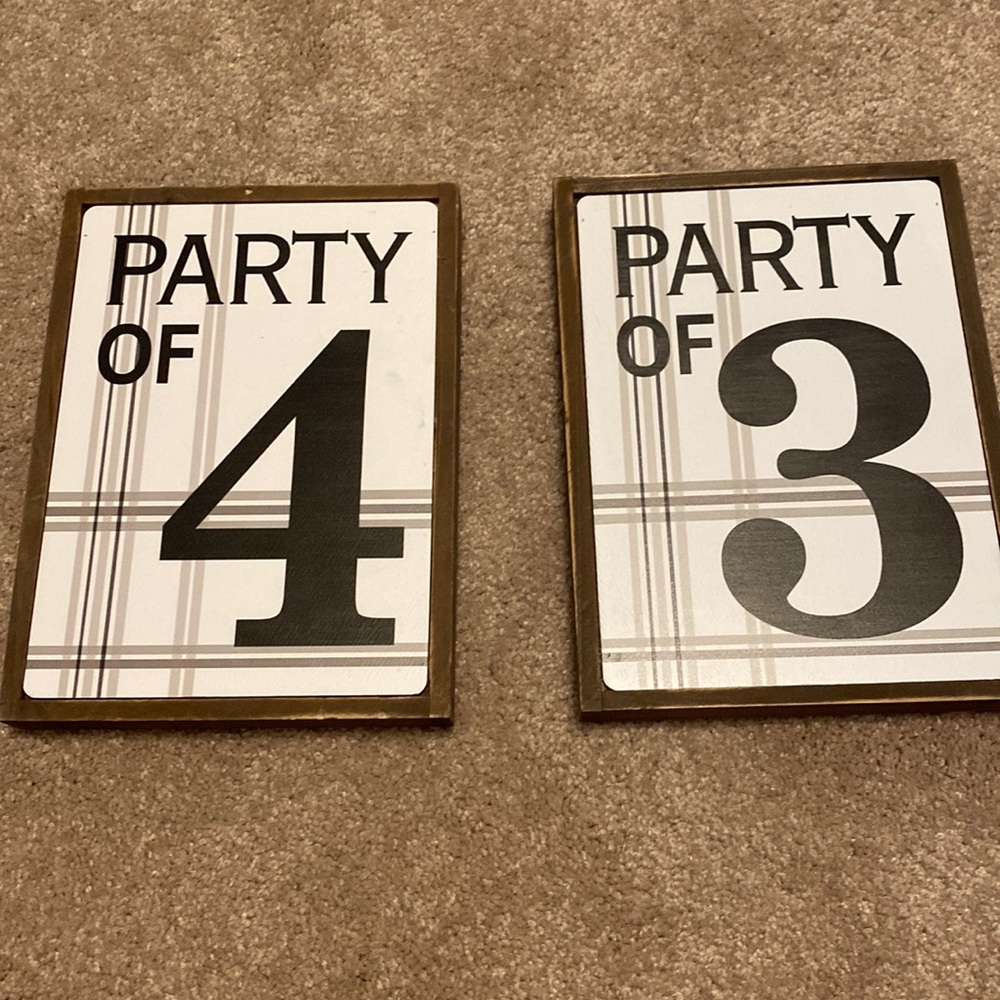 Party of 3 and Party of 4 signs